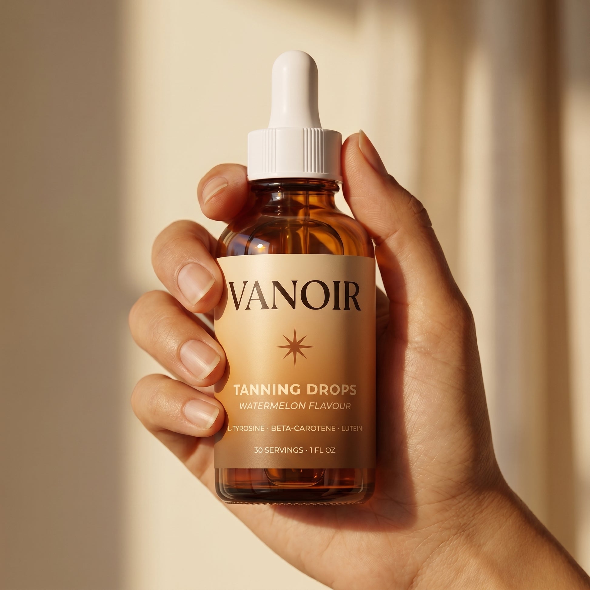 Bottle held in hand in warm natural light