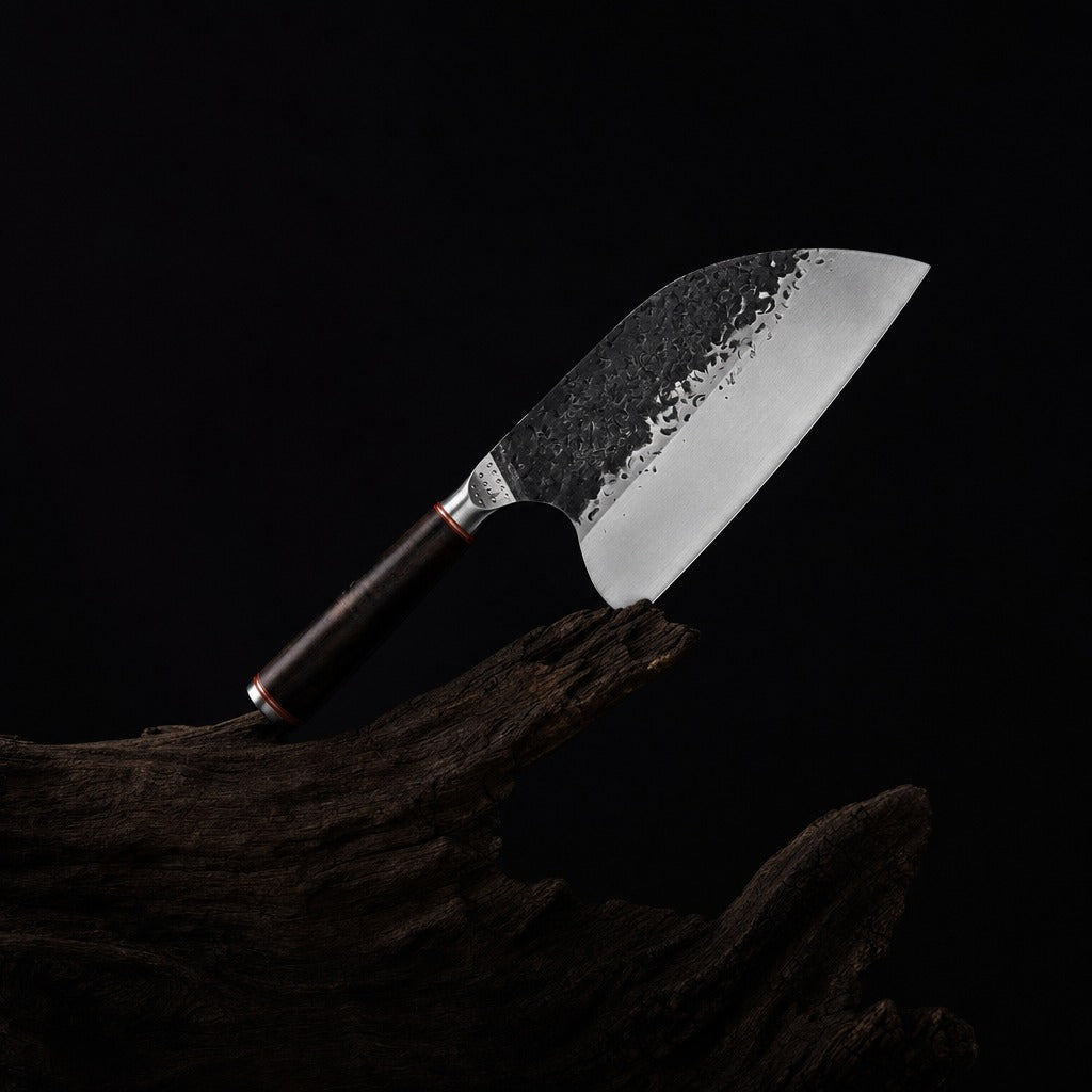 Mister Teuchi hand-forged 8 inch chef knife on charred driftwood