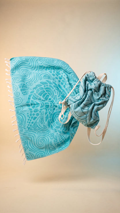 2-in-1 transformation — beach towel becomes a backpack
