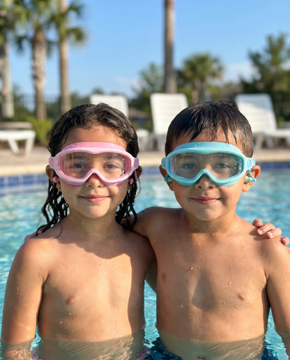 Two kids in pool wearing Bubblegum and Reef goggles