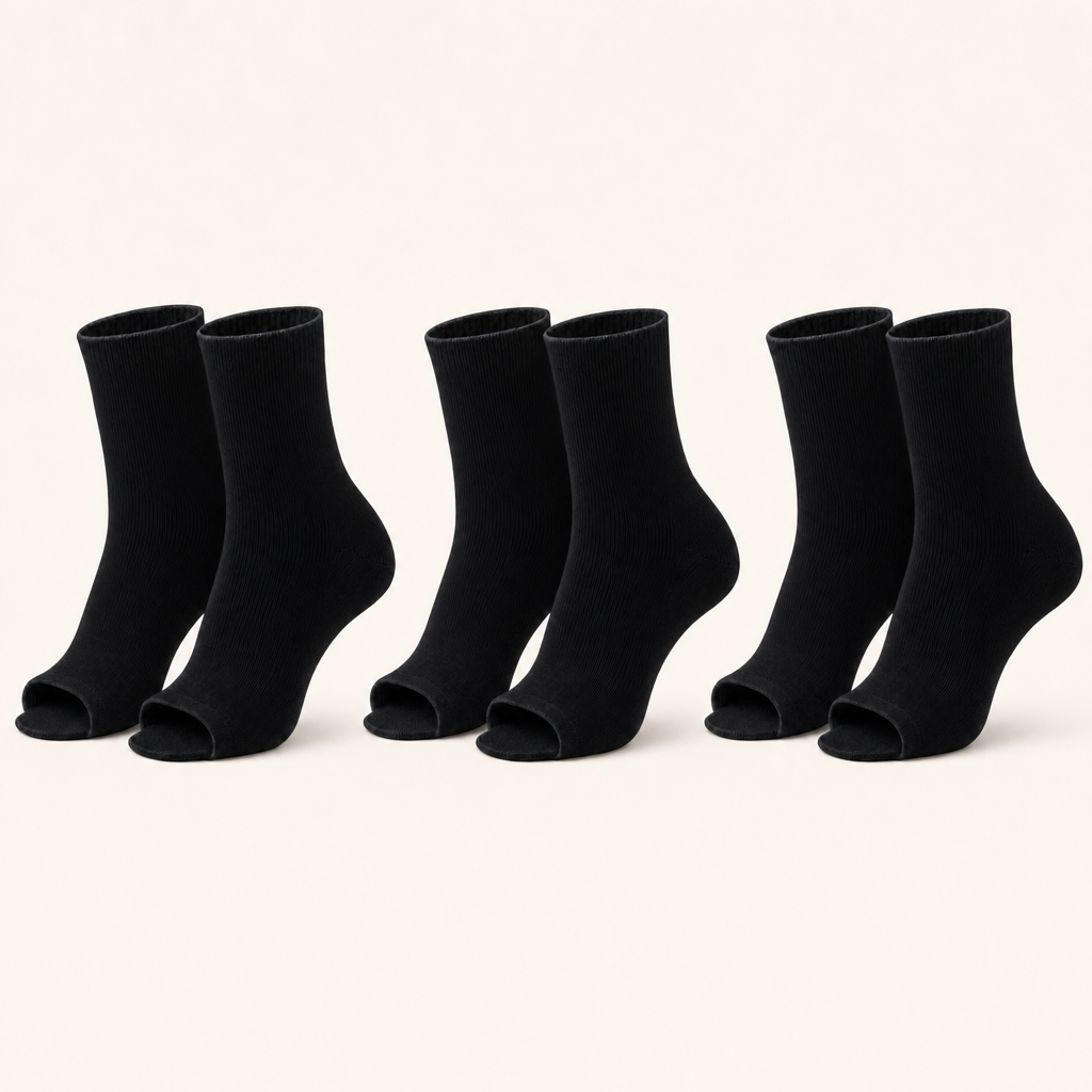 3 pairs of plain open-toe ankle compression socks in black, standing upright