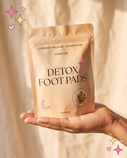Vanoir Detox Foot Pads pouch held in palm — scale shot