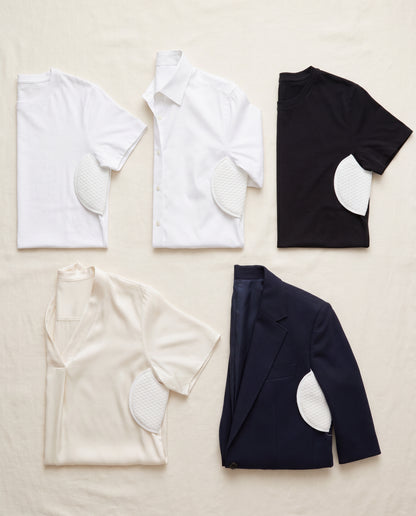 Sweat pads in five different shirts — variety flat-lay